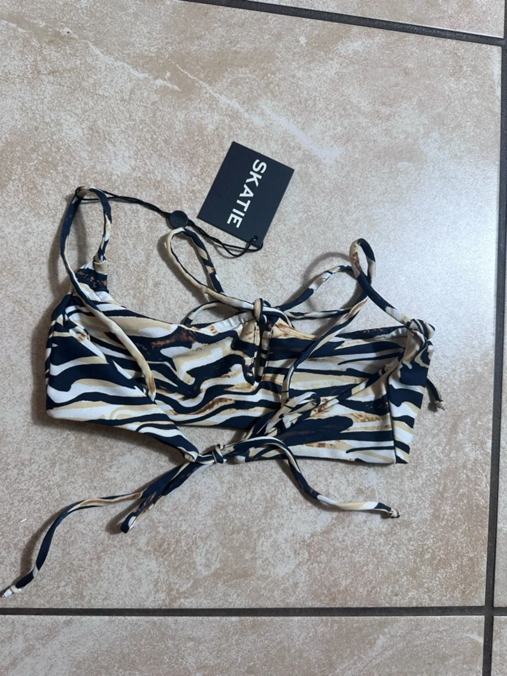 Skatie Swirl-Print Bikini Top in Black, Cream, and Brown